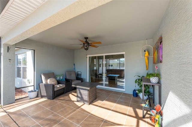 view of patio / terrace featuring ceiling fan