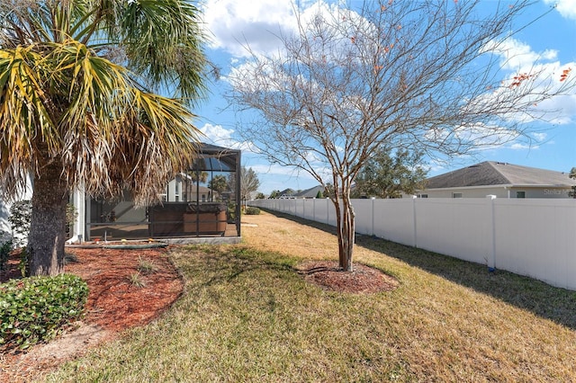 view of yard featuring a lanai