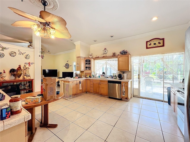 kitchen with crown molding, light brown cabinets, light tile patterned floors, stainless steel dishwasher, and ceiling fan