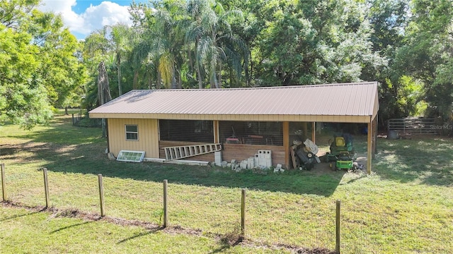 view of front facade with an outbuilding