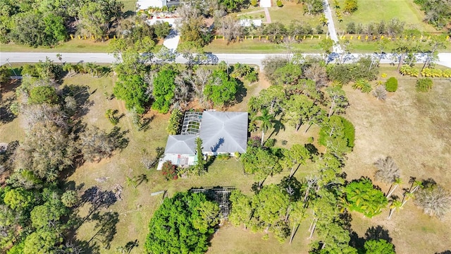 birds eye view of property featuring a rural view