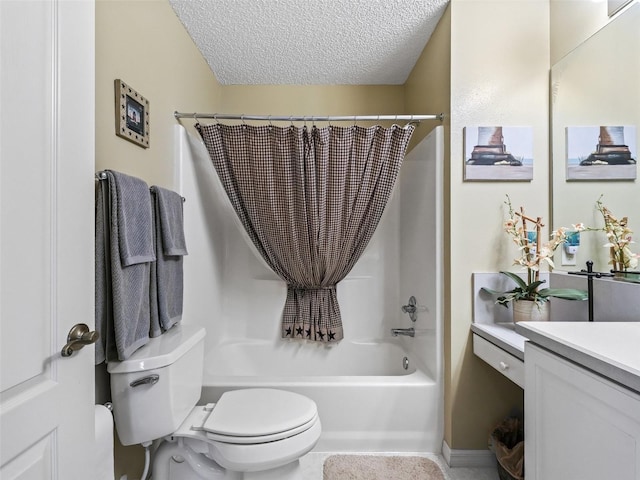 full bathroom with vanity, toilet, a textured ceiling, and shower / bath combo