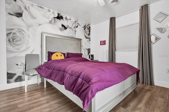 bedroom featuring hardwood / wood-style floors