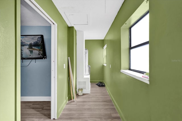 corridor featuring light hardwood / wood-style flooring