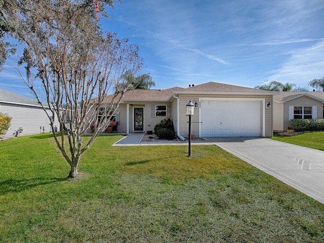 ranch-style house with a garage and a front lawn