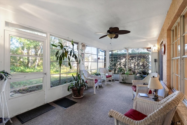 sunroom with ceiling fan