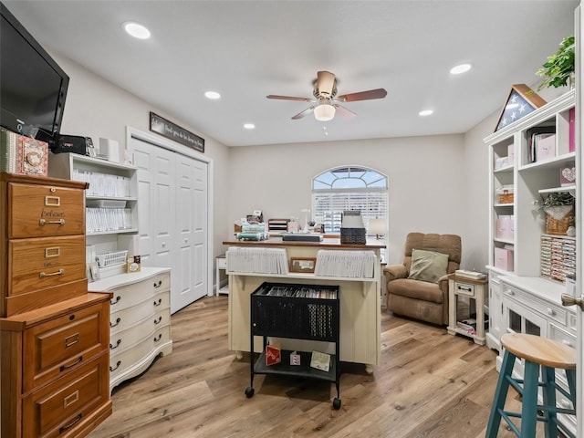 office featuring ceiling fan and light hardwood / wood-style floors