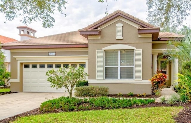 view of front of property with a garage