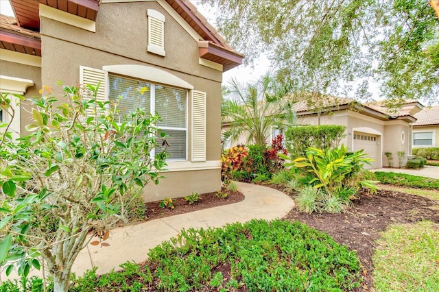 exterior space featuring a garage