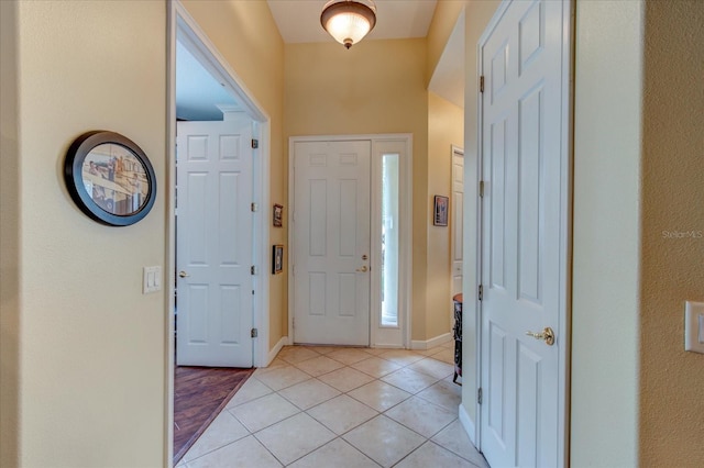 entrance foyer featuring light tile patterned flooring