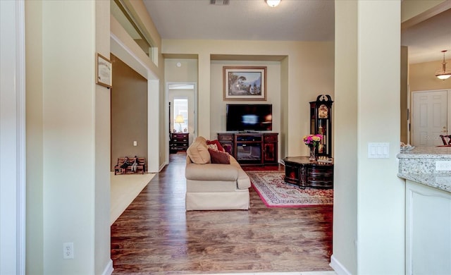 living room featuring dark hardwood / wood-style floors