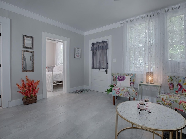 sitting room with crown molding