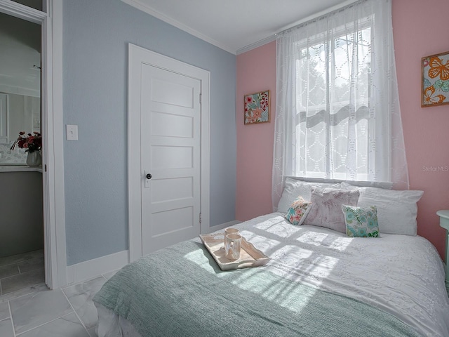 bedroom featuring crown molding