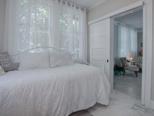 bedroom featuring ornamental molding