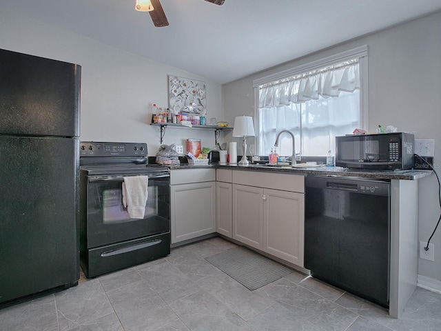 kitchen featuring sink, white cabinetry, vaulted ceiling, ceiling fan, and black appliances