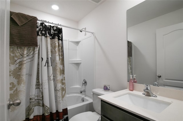 full bathroom featuring shower / tub combo with curtain, vanity, and toilet