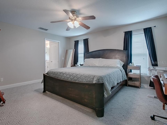 bedroom with ceiling fan and carpet flooring