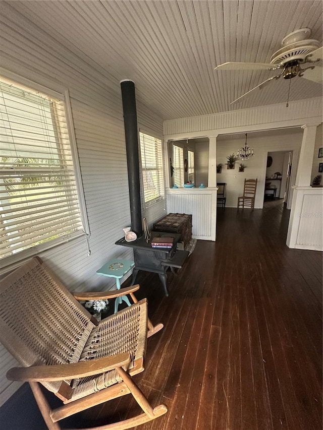 wooden terrace featuring ceiling fan