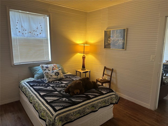 bedroom featuring dark hardwood / wood-style floors