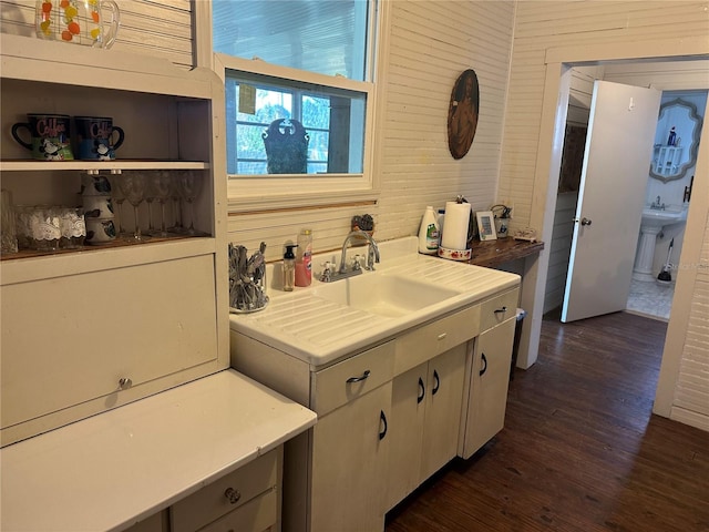 bathroom featuring sink and hardwood / wood-style floors