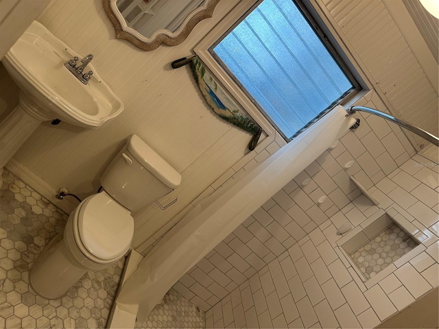 bathroom featuring toilet