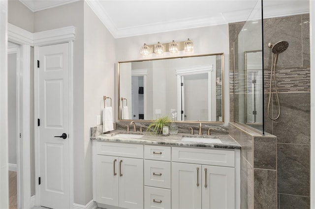 full bath featuring a walk in shower, ornamental molding, and a sink