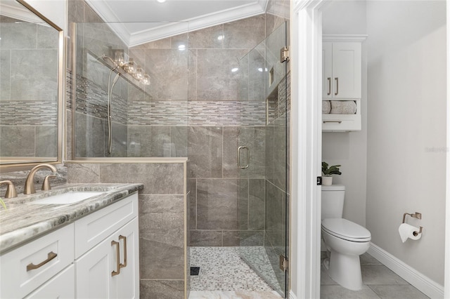 full bath featuring toilet, ornamental molding, a shower stall, vanity, and baseboards