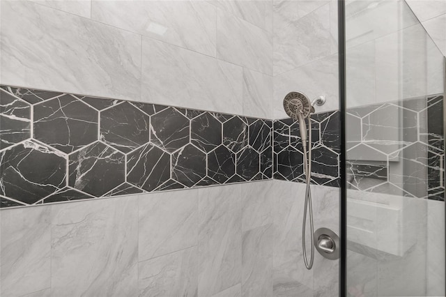 details featuring a tile shower