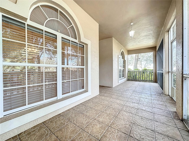 view of unfurnished sunroom