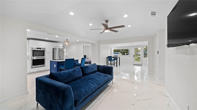 living room with ceiling fan