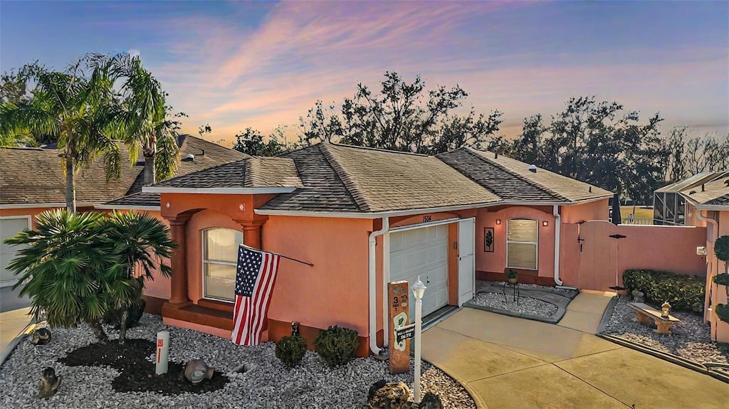 view of front of property with a garage