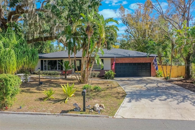 single story home with a garage