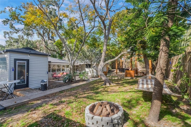 view of yard featuring a fire pit