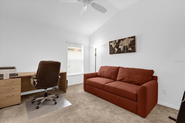 carpeted office featuring lofted ceiling and ceiling fan