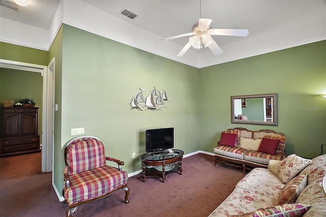 carpeted living room featuring ceiling fan