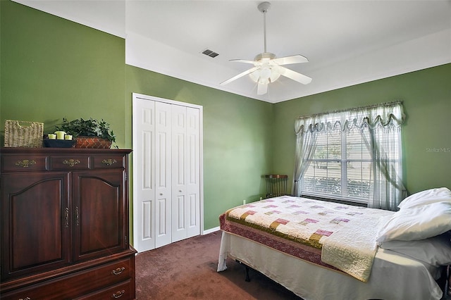 carpeted bedroom featuring ceiling fan and a closet