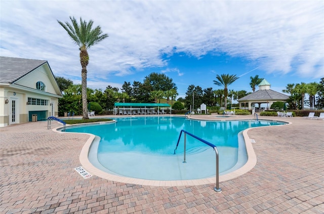 view of pool featuring a patio