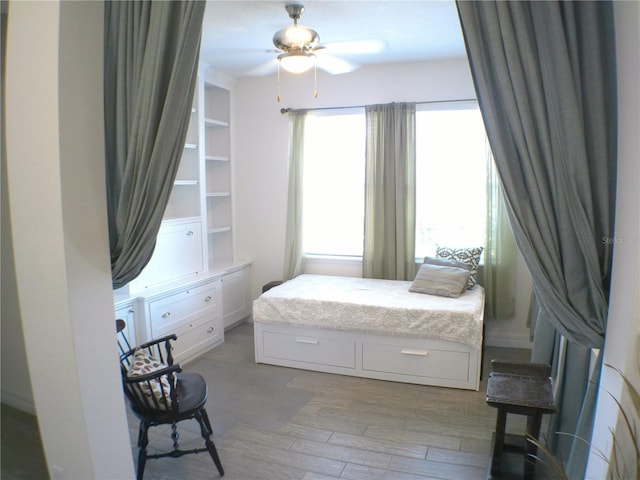 bedroom featuring ceiling fan and light hardwood / wood-style floors