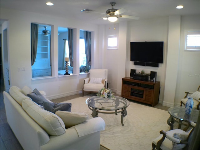 living room with ceiling fan