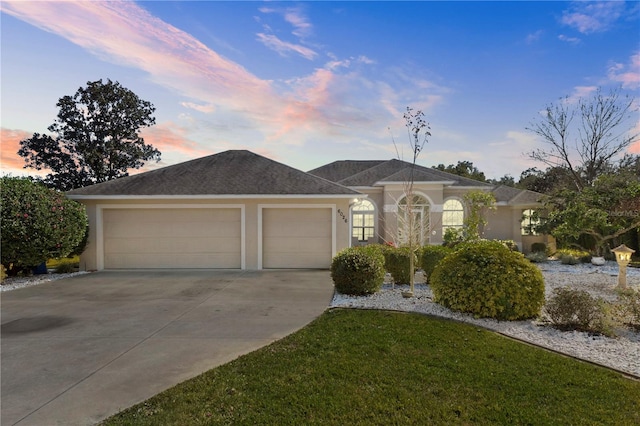 ranch-style home with a garage