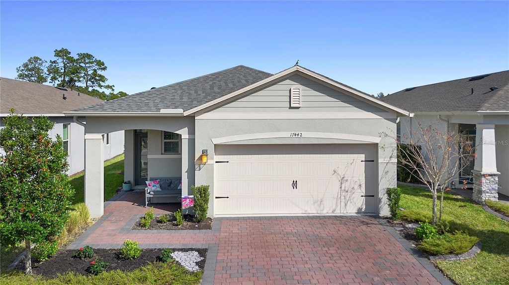 ranch-style house with a garage