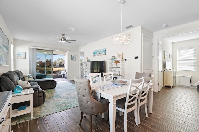 dining space featuring plenty of natural light and ceiling fan