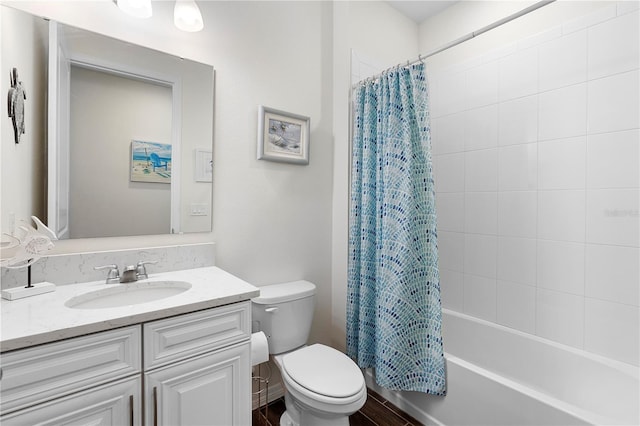 full bathroom featuring vanity, shower / bath combination with curtain, and toilet