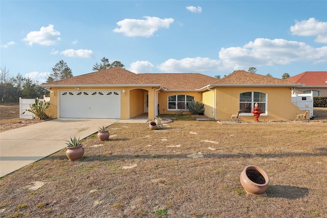 single story home featuring a garage