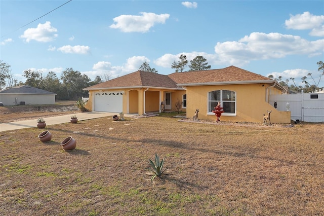 single story home with roof with shingles, stucco siding, fence, a garage, and driveway