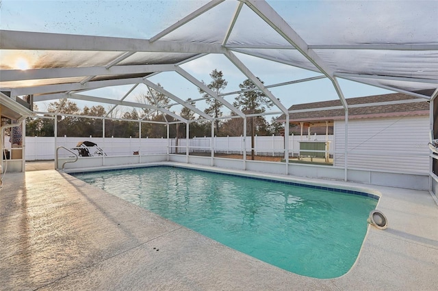 view of pool featuring a lanai, a patio area, a fenced backyard, and a fenced in pool