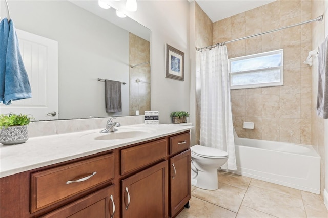 full bathroom featuring shower / tub combo with curtain, vanity, tile patterned flooring, and toilet