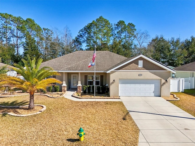 ranch-style house featuring a garage