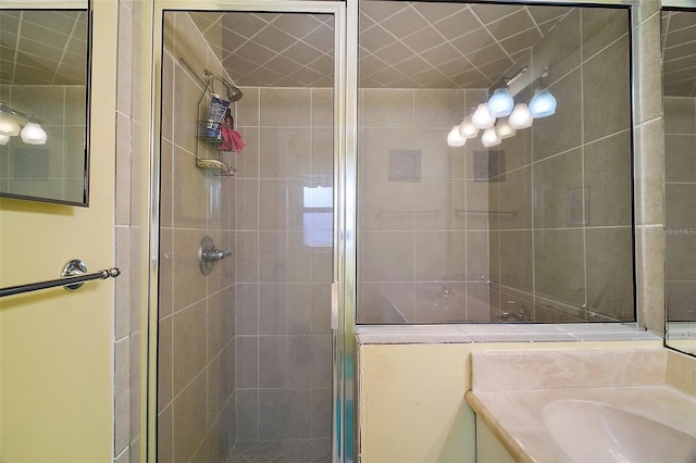 bathroom with vanity and a shower stall