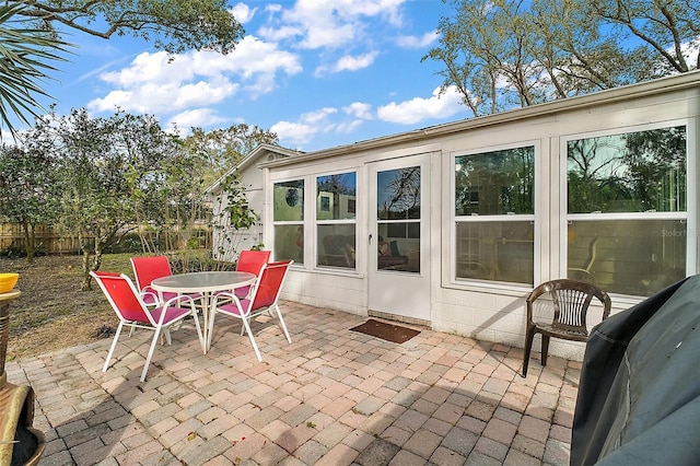 view of patio / terrace featuring fence